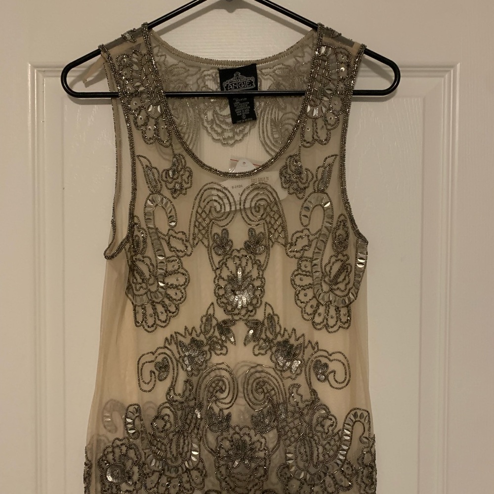 Gorgeous sheer blouse with amazing beaded details